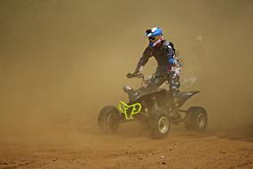 Motocross Enduro in a dusty haze