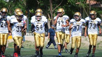 soccer team in uniform and helmets