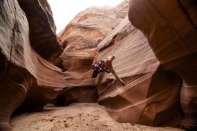 man in canyon cave