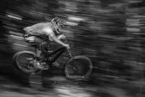 monochrome photo of Bicycle in motion