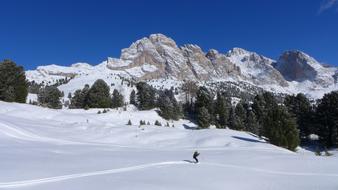 Skiing on Dolomites Snowy Val Gardena