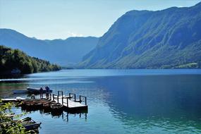 Beautiful and colorful pier of Lake Bohinj, among the mountains in Slovenia