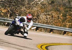 sports bike at speed on a winding road
