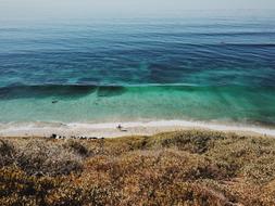 Beautiful and colorful beach, near the blue and turquoise water
