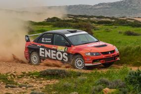 Rally, eneos Race Car speeding on dirt road, cyprus