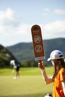 golf on a sunny day in a blurred background