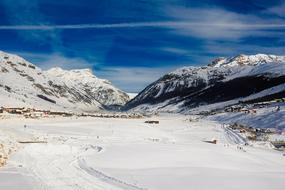 snowy valley in the alpine mountains