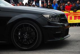 black car at the start of the races close-up