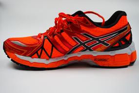 Side view of the beautiful and colorful "Asics Kayano" running shoe
