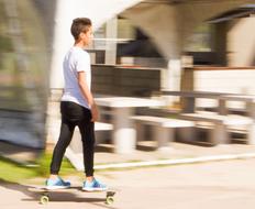 guy on a skateboard in a blurred background