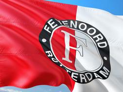 white red flag with soccer logo