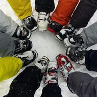 feet in ski boots in a circle