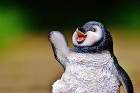 Penguin Figure Cute close-up on blurred background