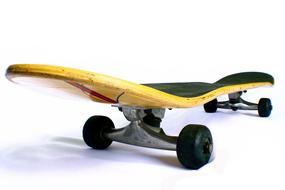 yellow-black skateboard on white background