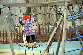 Climbing Child on playground