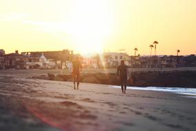 surfers on Ocean Water beach