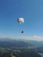 Paragliding Flying over Mountains