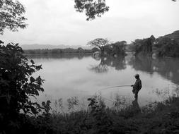 Fisherman on calm Lake, Black And White, sri lanka