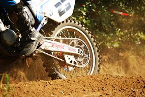 Motocross Enduro in the dust close-up