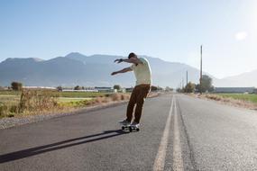 alone skater on road