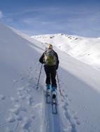 ski tourism in the mountains on a sunny day