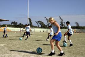 girls and boys in soccer practice