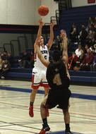 Basketball player, shooting ball on the court, on the competition with viewers