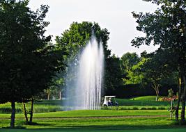 fountain on a green golf course