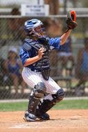 catcher on a baseball field during a tournament