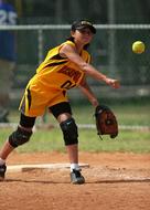 Softball Throwing Girl in yellow uniform
