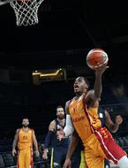 Players, playing basketball on the game of the Tahincioglu Basketball Super League, on the court, on the competition
