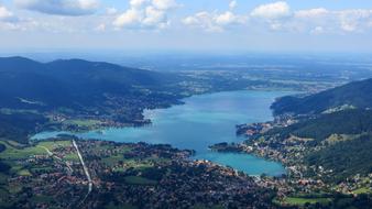 Beautiful and colorful landscape of Tegernsee, Germany, with the lake, under the sky with clouds