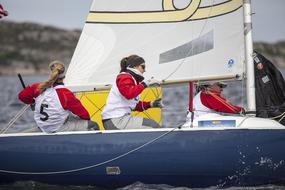 sports team women sailing boat