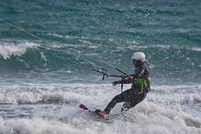 Kitesurfer in the waves close-up