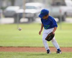 minor league baseball player on field on blurred background