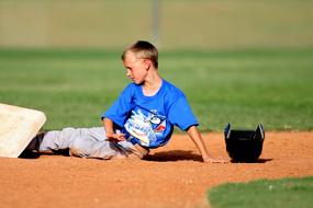 an athlete sits at second base in baseball