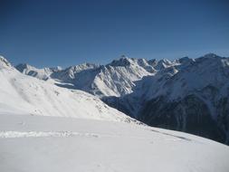 ski trace on mountain slope at snowy peaks, austria, SÃ¶lden