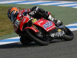 motorcyclist turns at high speed on the track