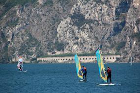 windsurfing on lake garda on a sunny day