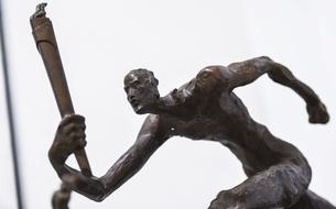 olympic sculpture with torch