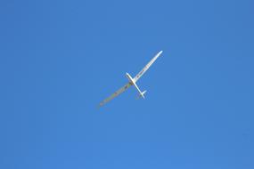 white Glider at clear blue sky