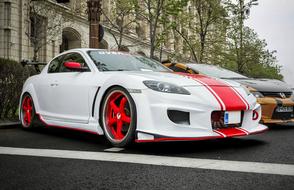 parked red white sports car