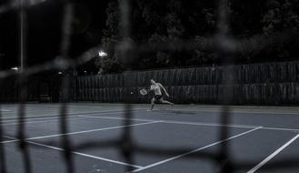 tennis court player in black and white