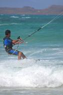 man kitesurfing