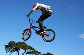 biker at jump at Blue Sky