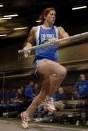 Pole Vaulter Athlete in a blurred background