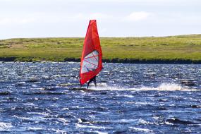 Windsurfing on a clear sunny day