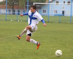 ball and jump of a football player on the field