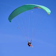 Paragliding in the blue sky as leisure