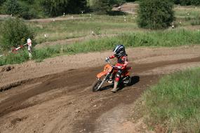 Motocross on a bend on a sunny day